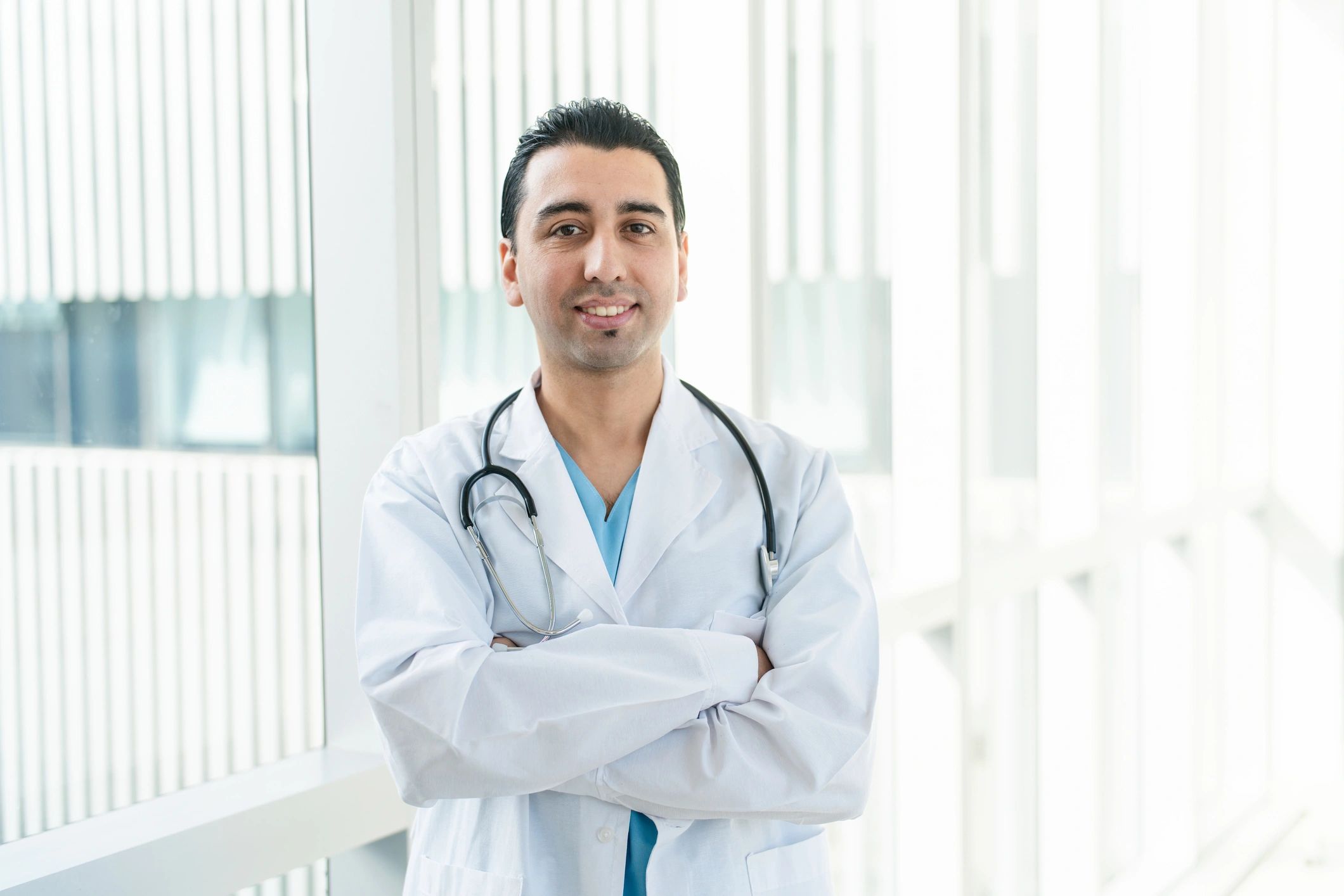 confident doctor with stethoscope modern hospital